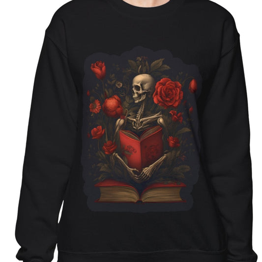 Person wearing a black sweatshirt with a skull and roses design on a white background