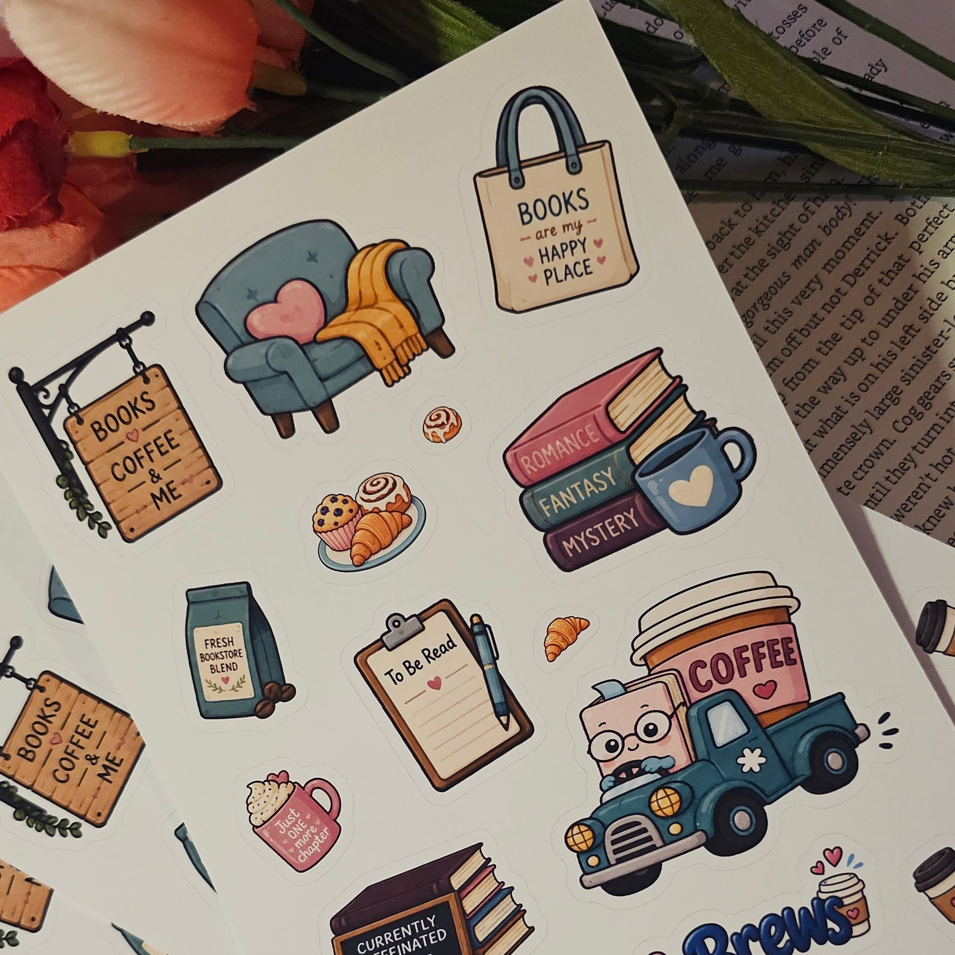 A sheet of cute, whimsical planner stickers themed around books and coffee, displayed on a lined notebook with decorative flowers in the background.