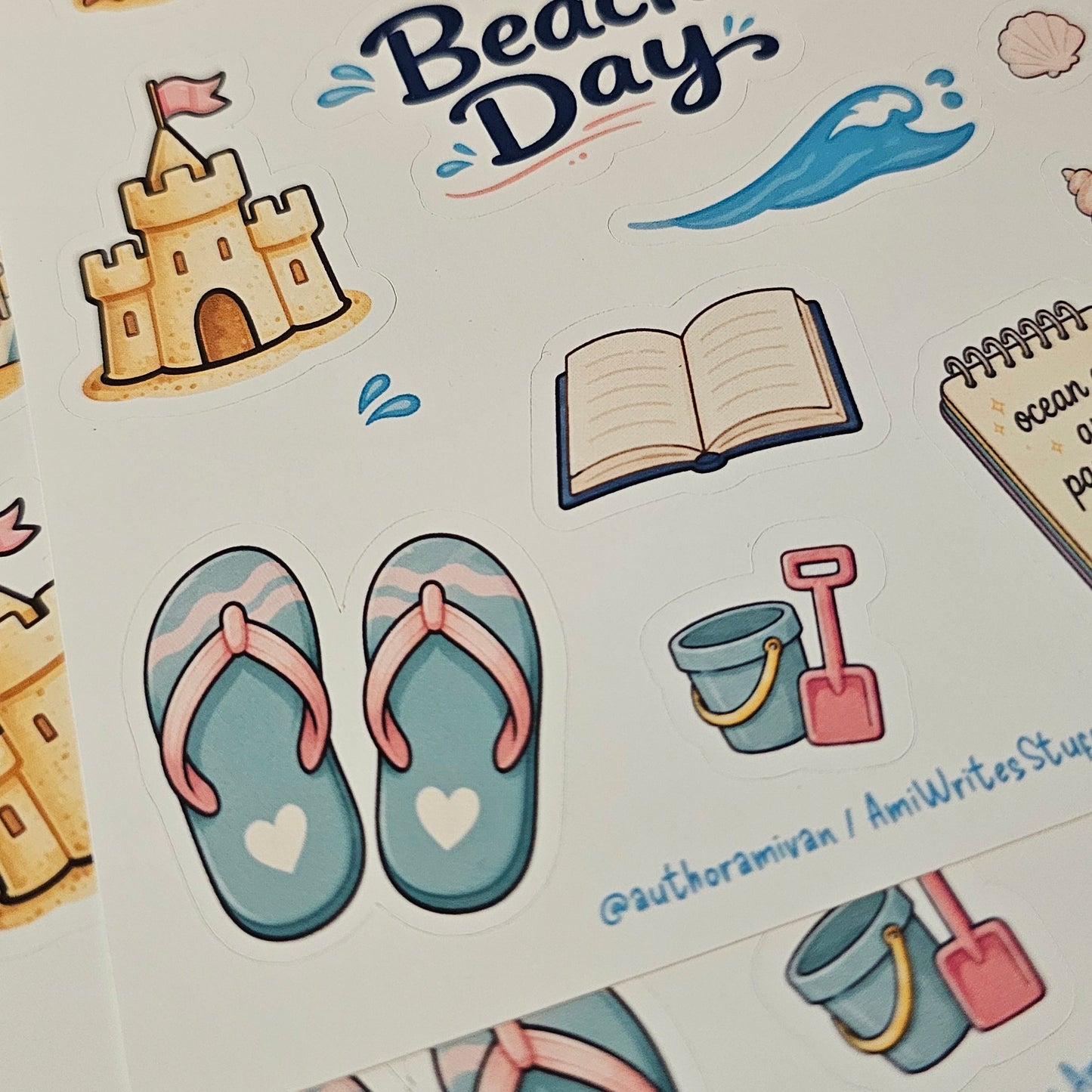 A sheet of colorful 'Beach Day' planner stickers featuring illustrations of flip-flops, a sandcastle, a beach umbrella, stacked towels, a starfish, and a notebook, displayed on a white background.