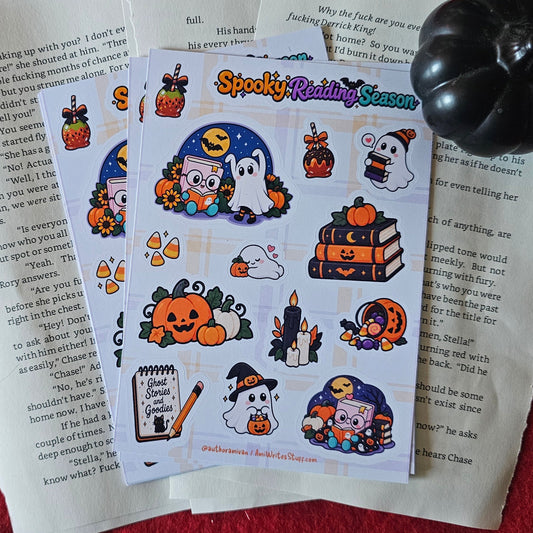 A set of colorful Halloween-themed sticker sheets featuring cartoon ghosts, pumpkins, and a witch, displayed on top of printed paper next to a small black pumpkin on a red textured background.